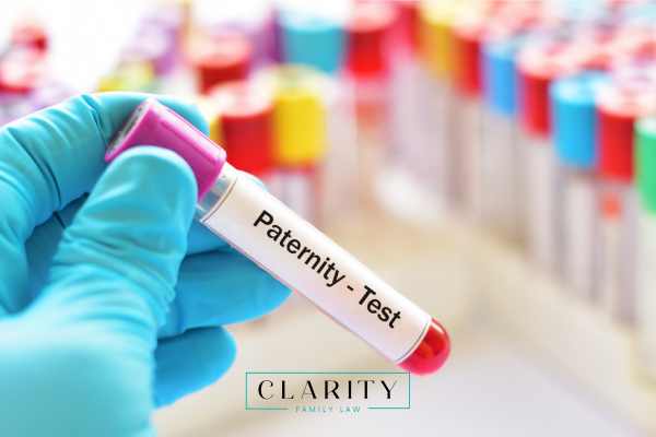 a medical personnel holding a paternity test